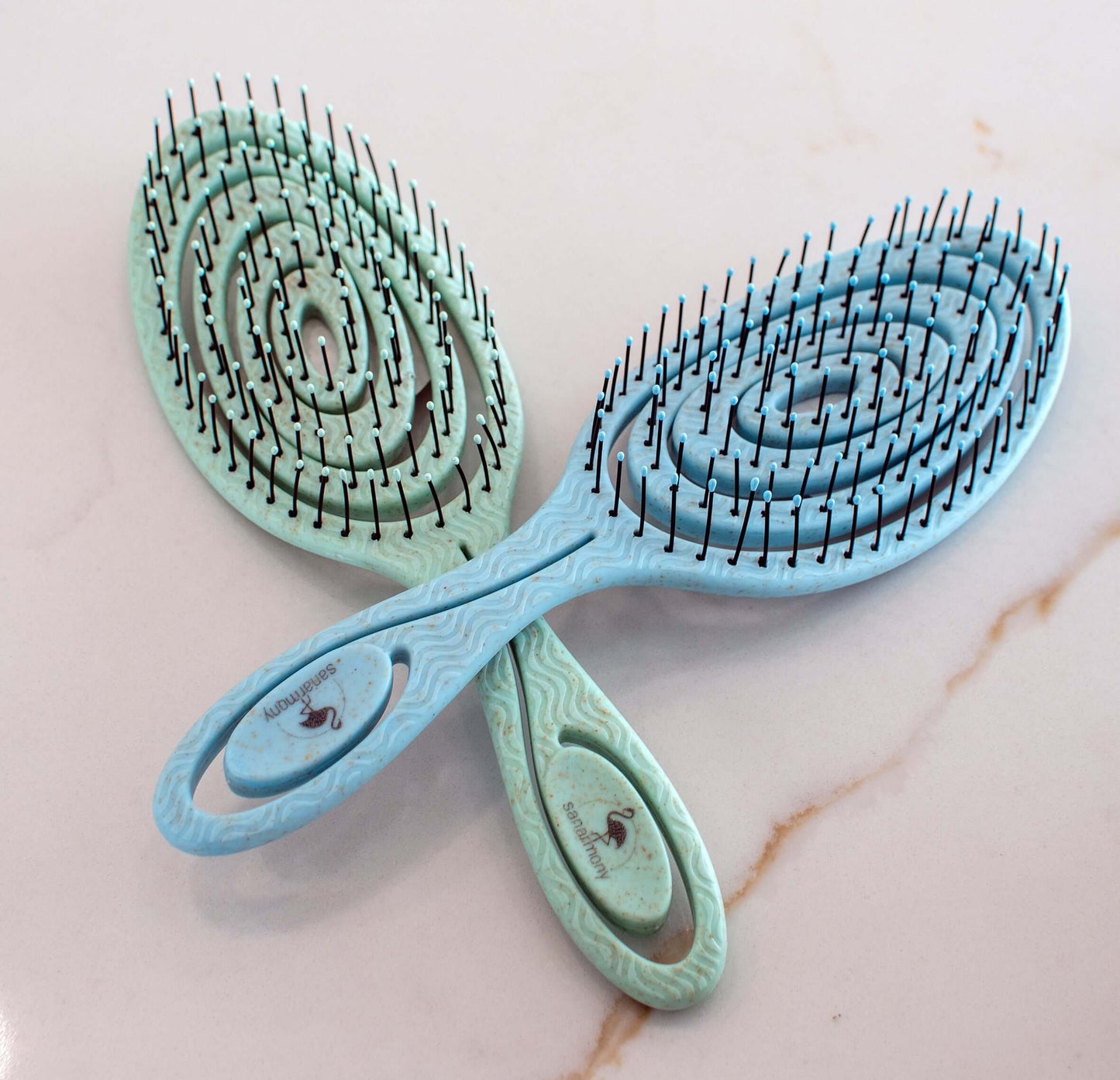 Ultimate Detangling Hair Brush for All Hair Types Effortlessly detangle any hair type with our brush - easy for thin, thick, wet, or dry hair. Gentle on hair, no pulling. Vegan & cruelty-free.